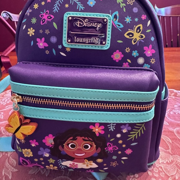 Loungefly Disney Mirabel Encanto Backpack! Perfect for Communicore opening! BNWT - Picture 1 of 5